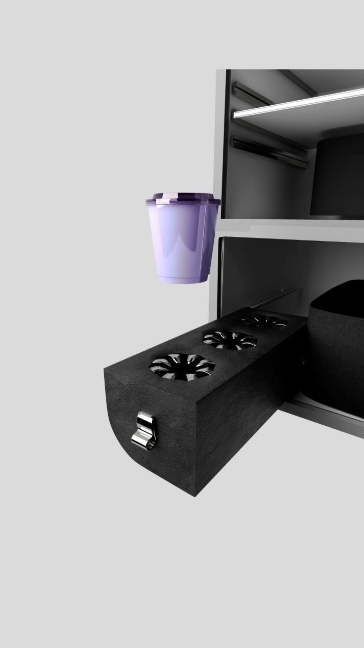 Close-up of the dedicated cup holder compartment